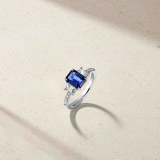 Nouveau Three Stone Emerald Cut Sapphire and Diamond Ring thumbnail